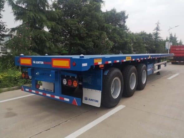 Sơ mi rơ mooc sàn 40-45 feet 3 trục cao cấp thép T1700 siêu cứng 4 Tải trọng mooc Junton đã được kiểm chứng thực tế